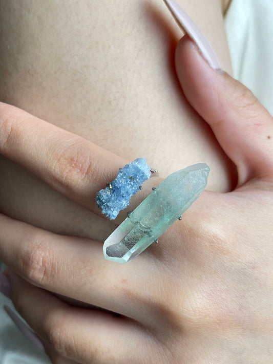 Close up of Fuchsite Phantom Quartz and Blue Sapphire ring worn on hand