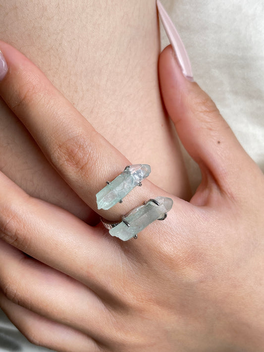 Close up of Fuchsite Phantom Quartz ring worn on hand