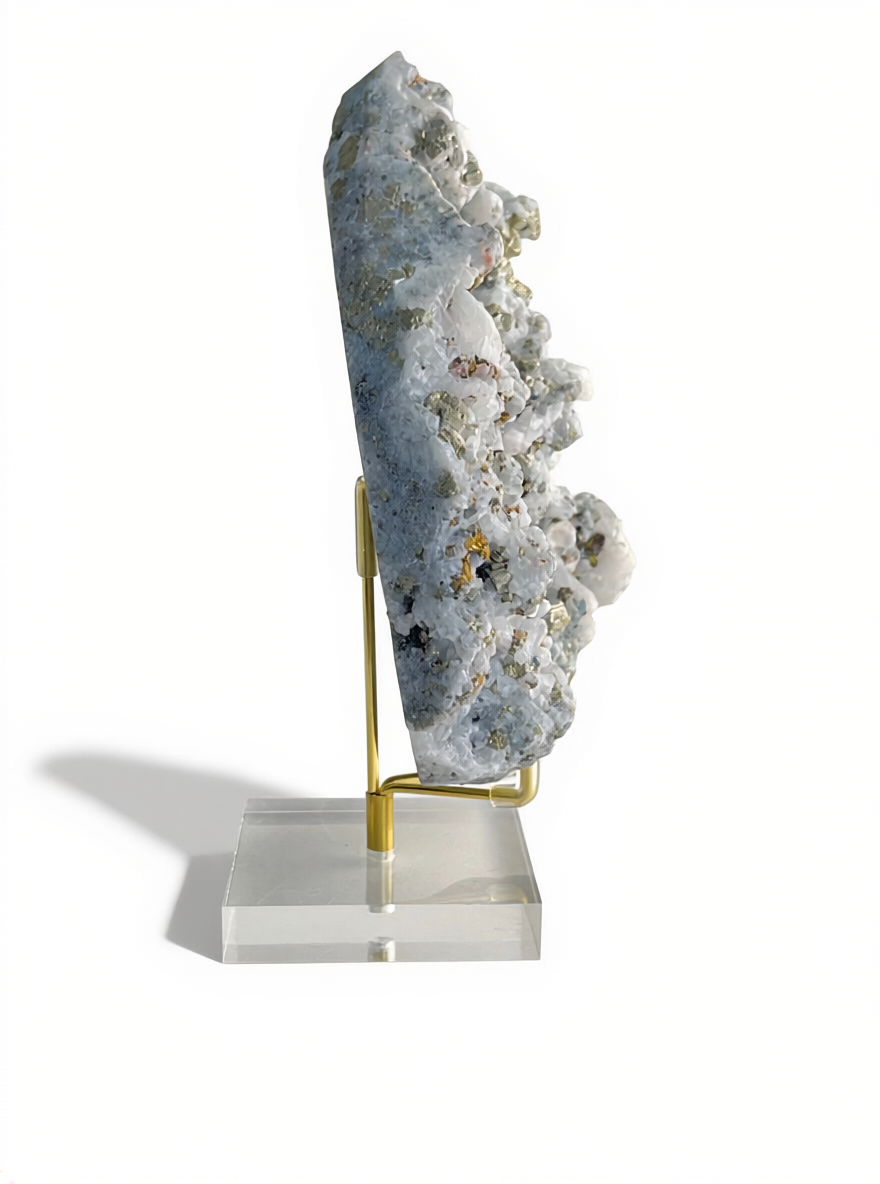 gray quartz and chalcopyrite mineral specimen showing layered crystal texture side view