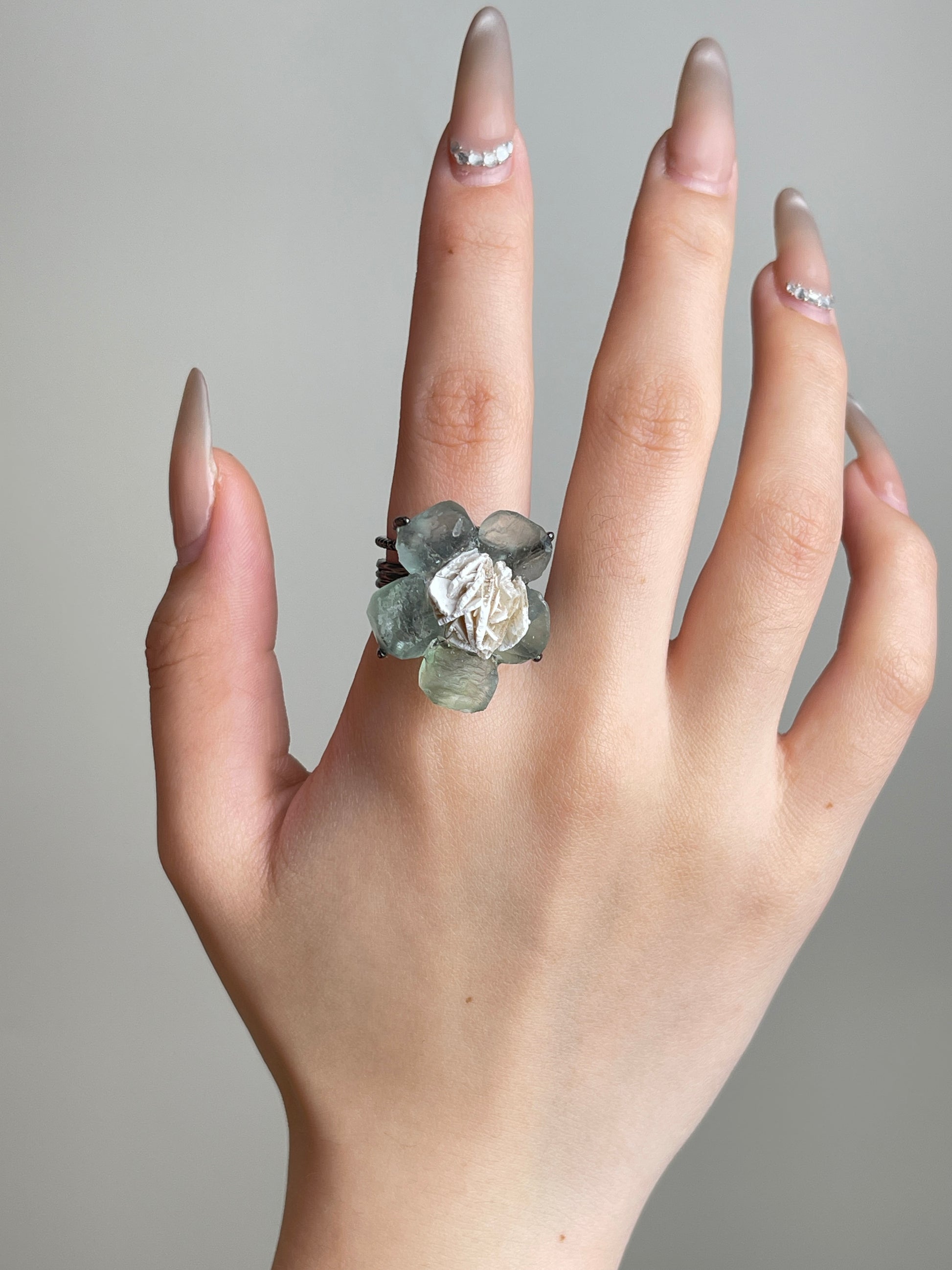Hand view of Green Fluorite Flower Ring with Desert Rose
