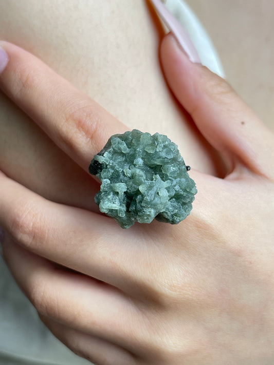 Close-up hand wearing Green Prehnite mineral specimen ring