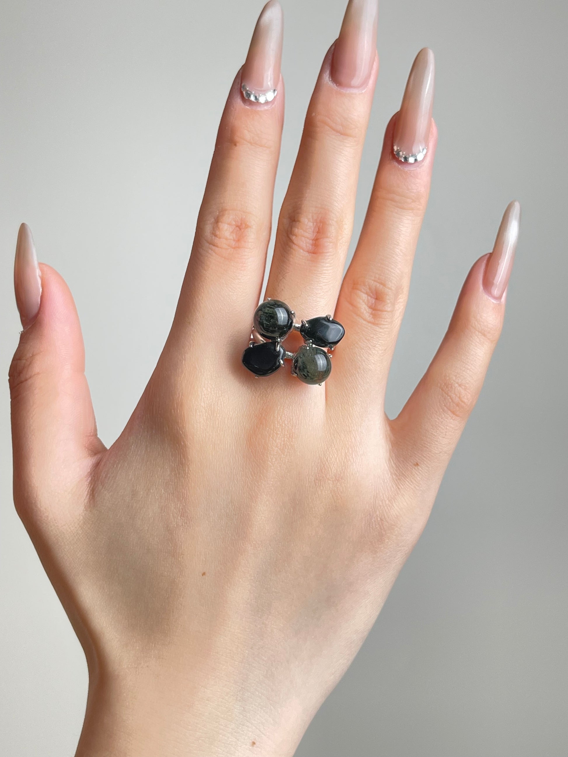 Green Rutilated Quartz and Smoky Quartz ring worn on hand