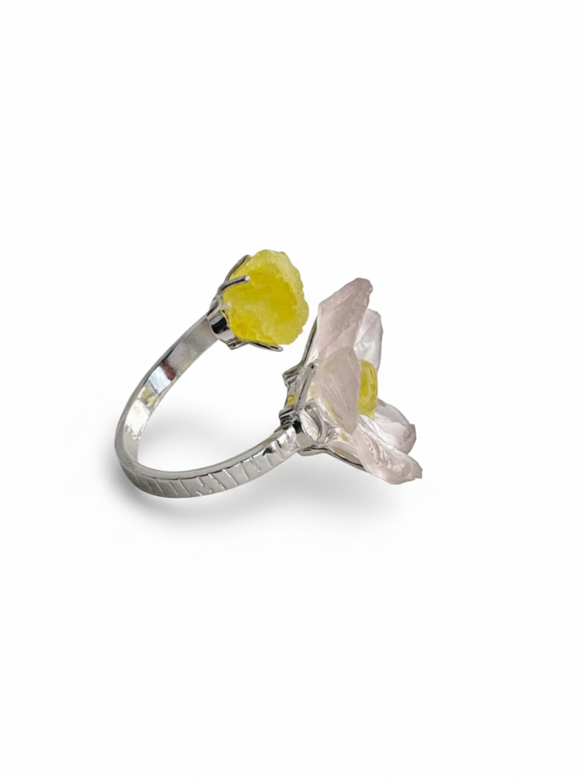 Side view of hand-carved Rose Quartz flower ring with Brucite