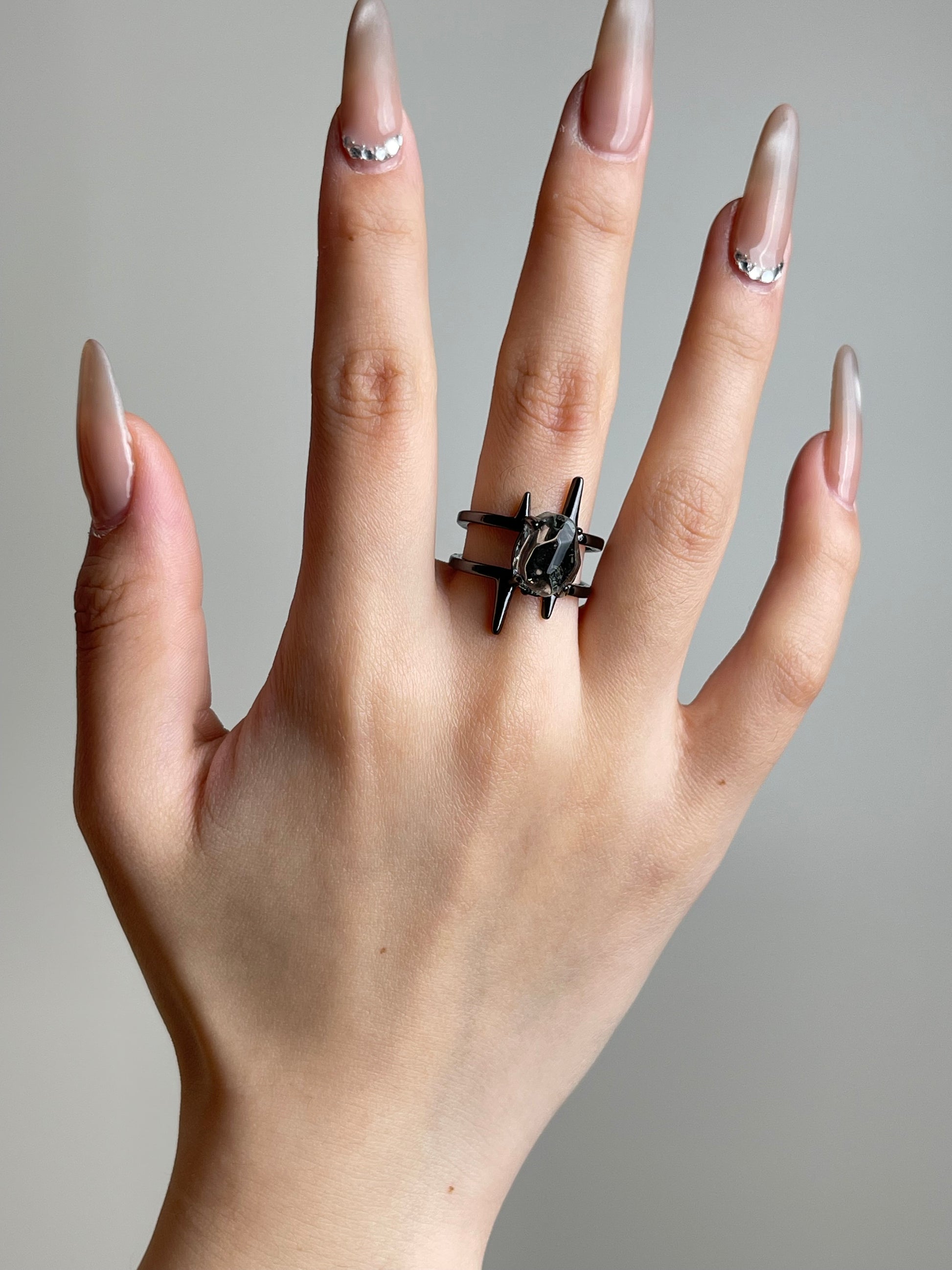 Hand shot of hand-cut Green Quartz ring by Oryssia