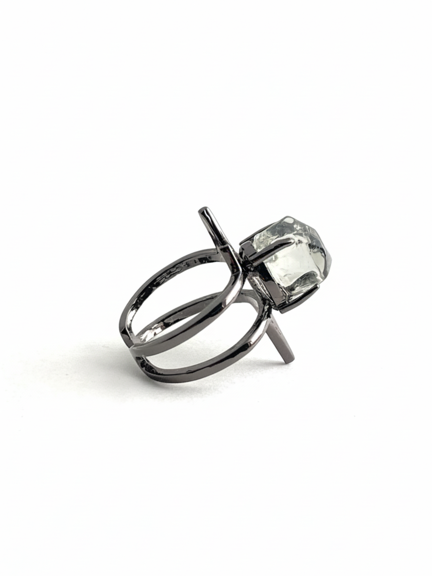 Side view of hand-cut Green Quartz ring in black rhodium setting