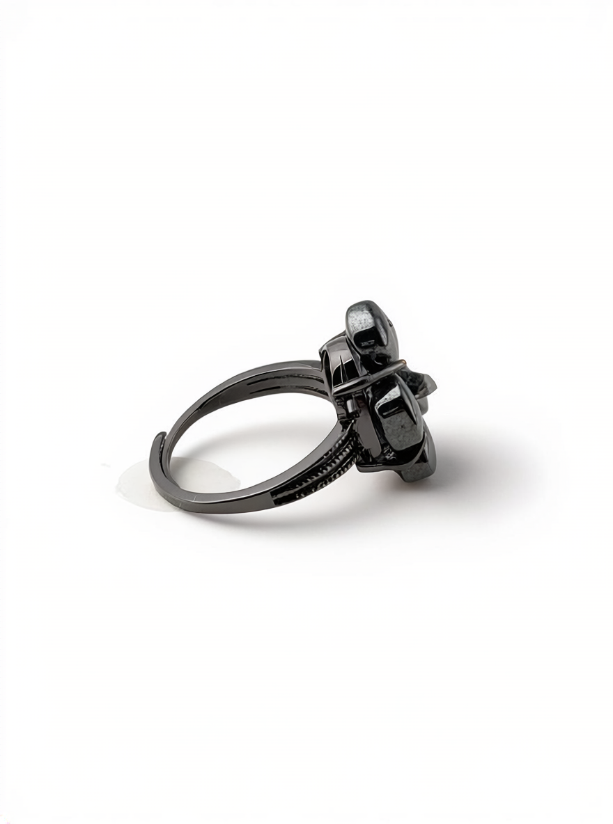 Side view of Hematite flower ring with Herkimer Diamond Quartz