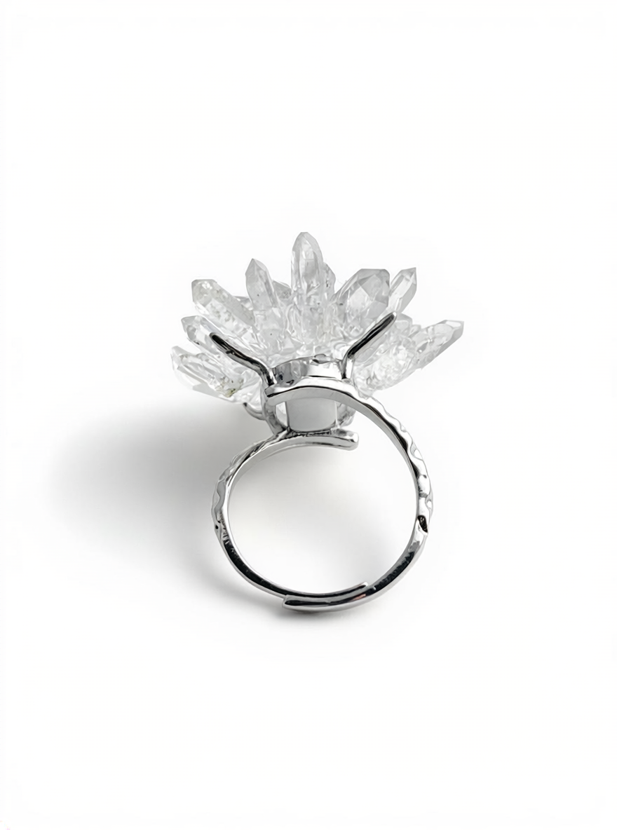 Back view of a Herkimer Diamond Quartz and Lemurian Quartz flower ring showing the crystal setting, open band, and silver tone finish