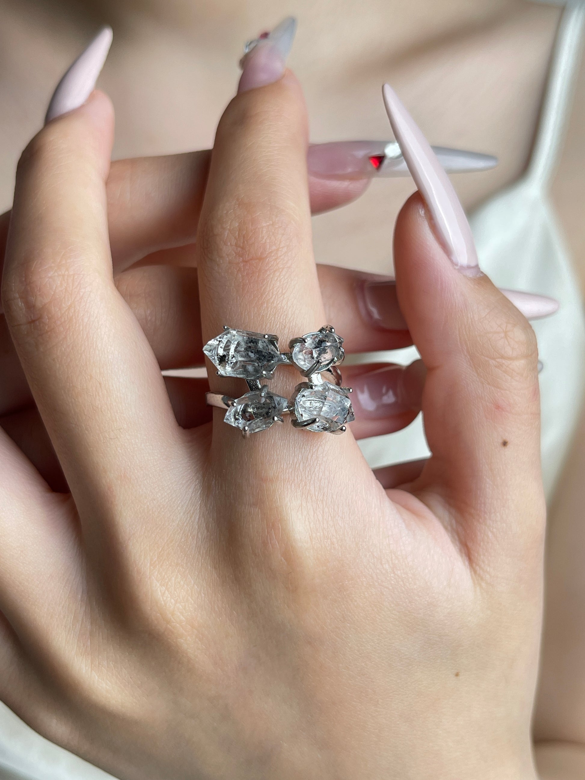 Herkimer Diamond Quartz four stone ring worn on hand