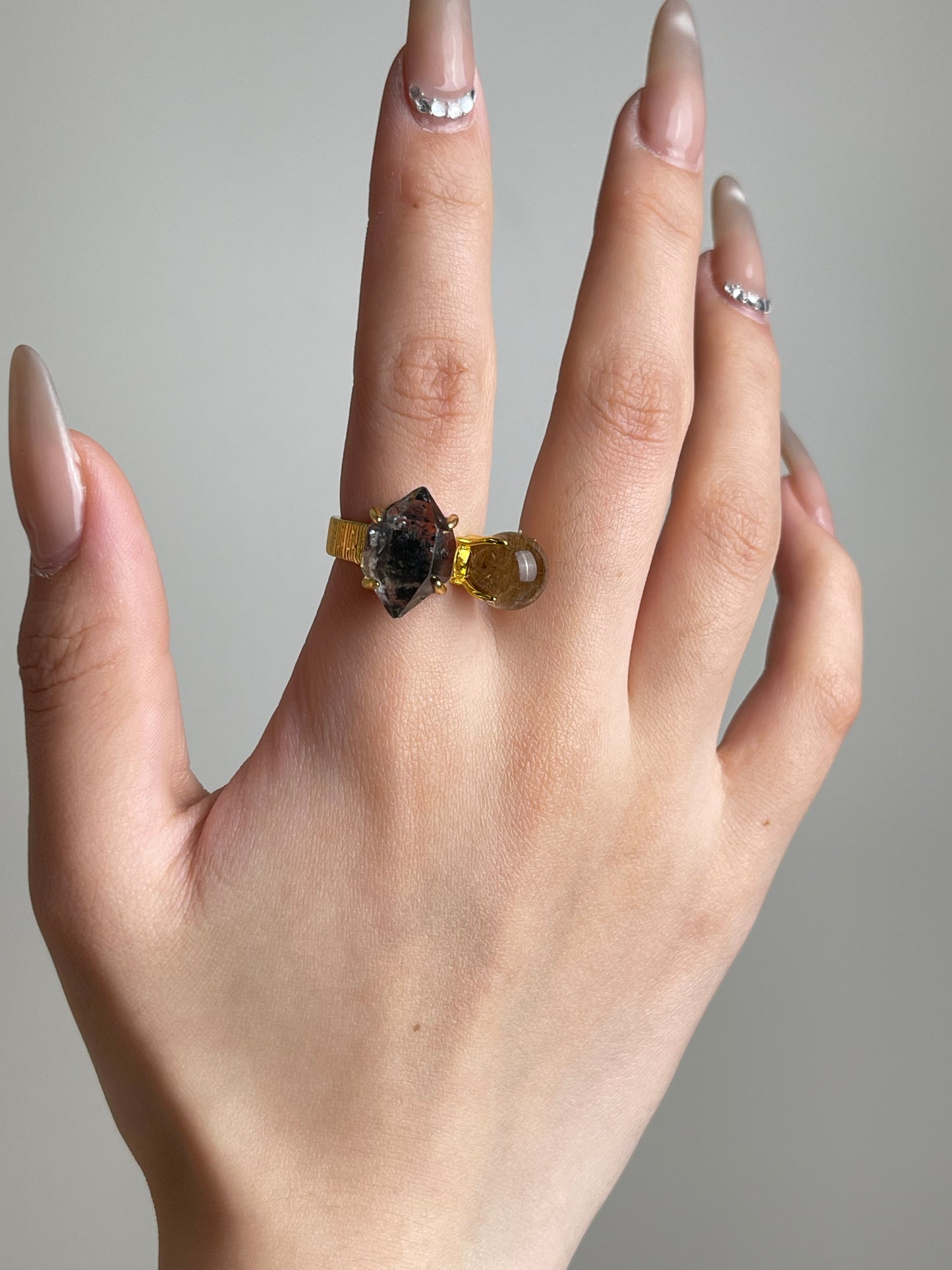 Herkimer Diamond Quartz and Rutilated Quartz Ring worn on hand by Oryssia