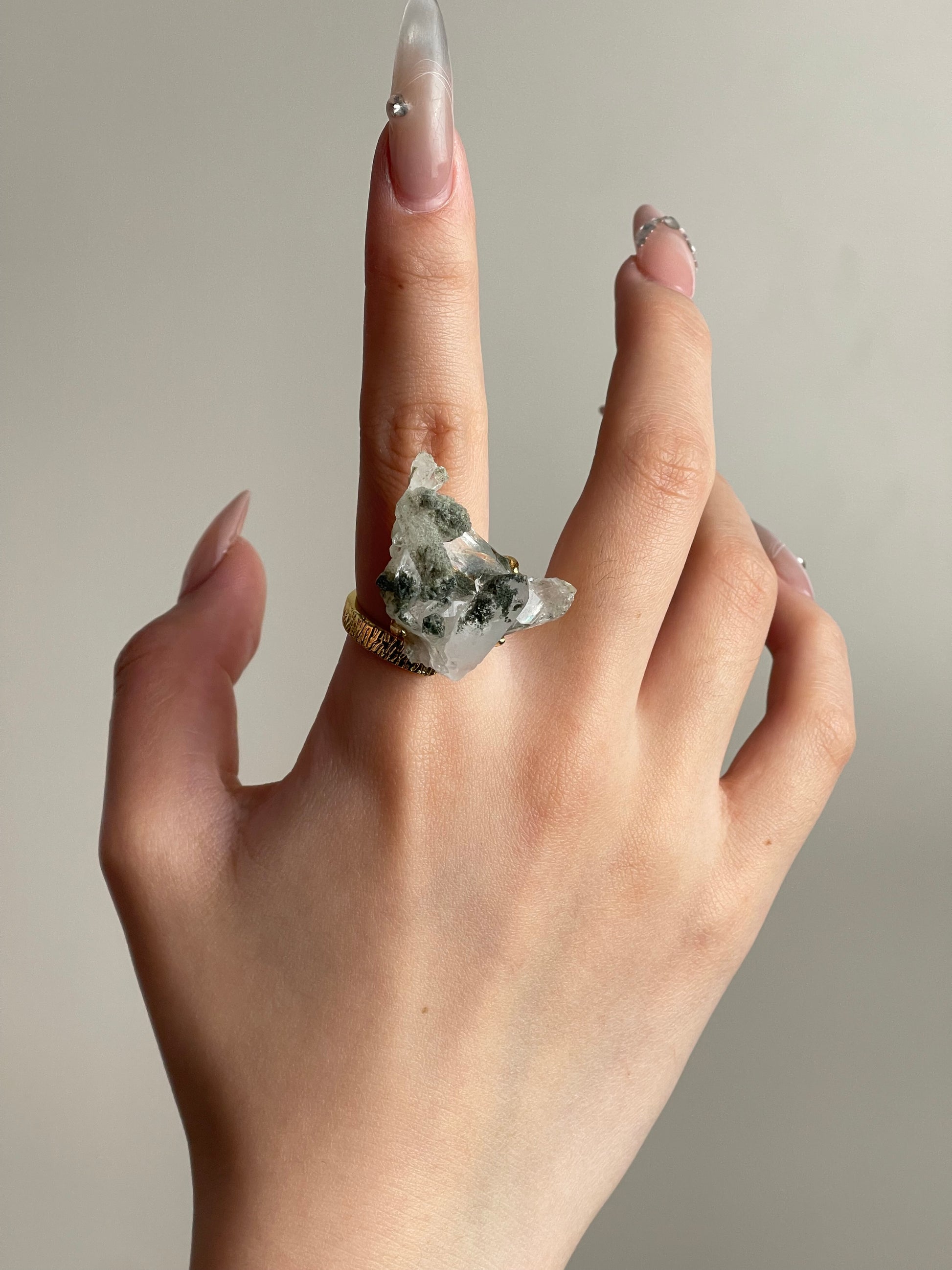 himalayan chlorite quartz crystal cluster ring worn on hand