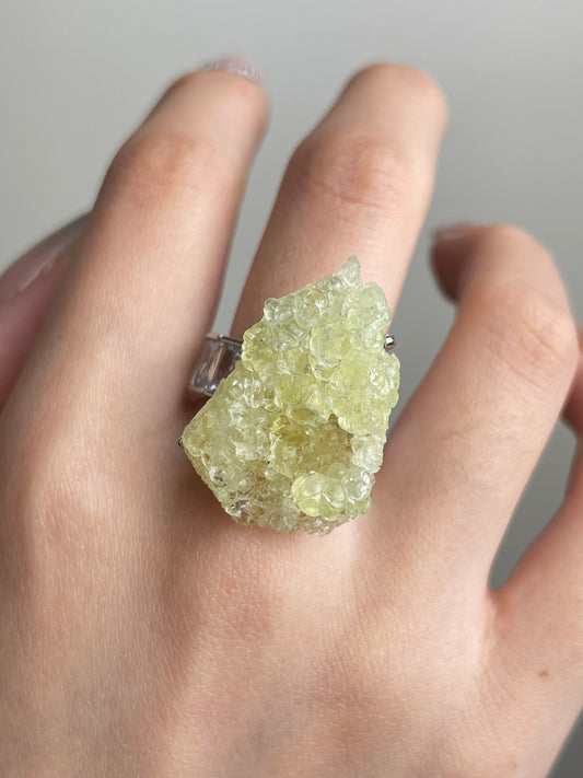 Hyalite Opal Ring close-up worn on hand