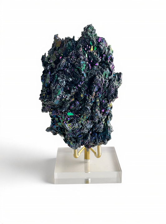 iridescent carborundum silicon carbide crystal specimen with metallic rainbow surface front view
