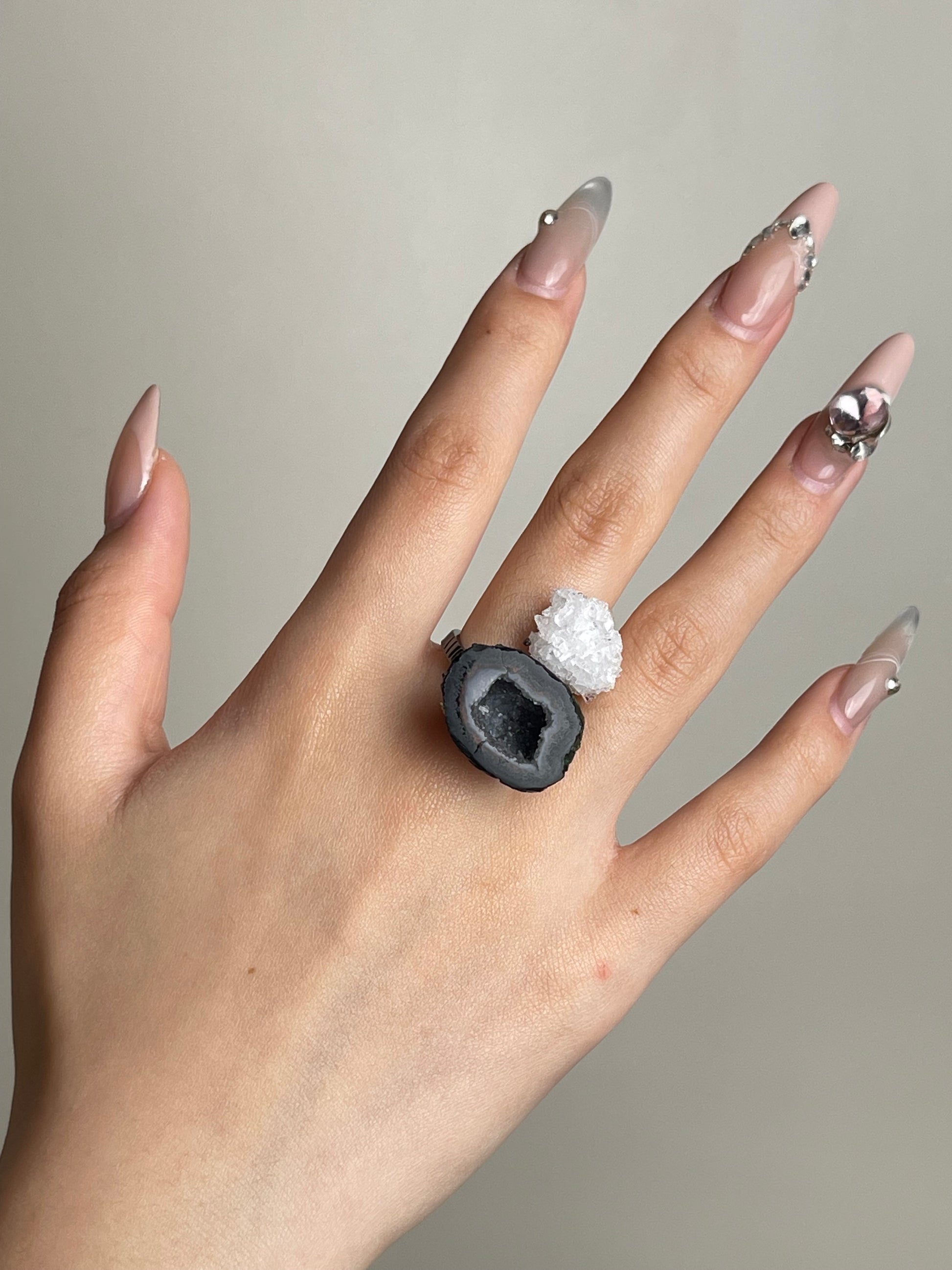 Mexican geode and apophyllite mineral specimen ring worn on hand