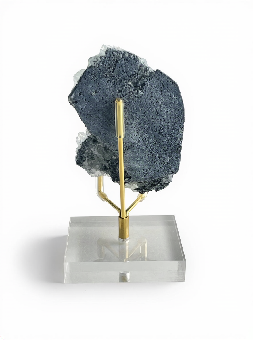 back view of fluorite quartz mineral specimen showing natural matrix
