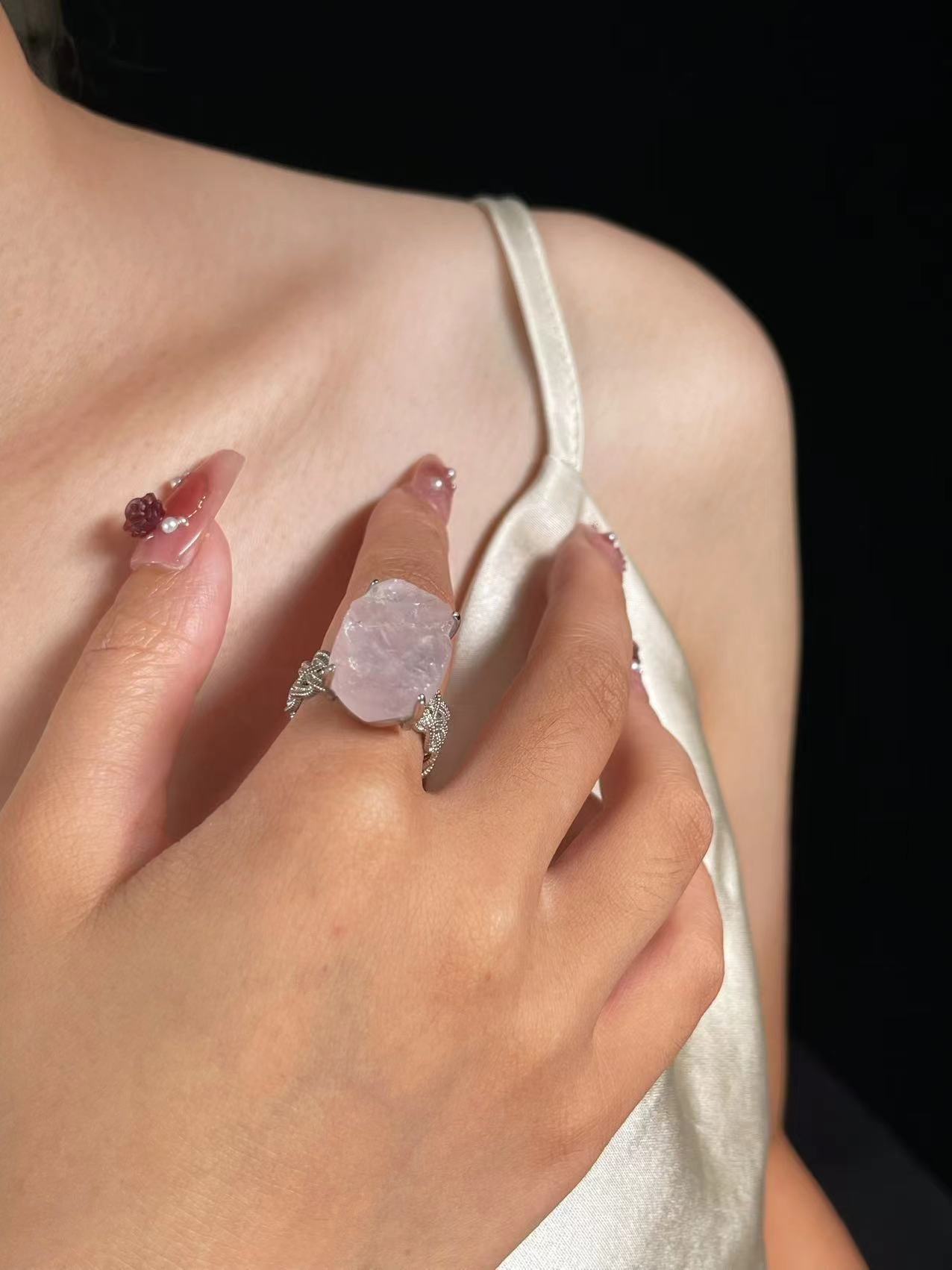 Rose Quartz ring with Twisted Band Setting
