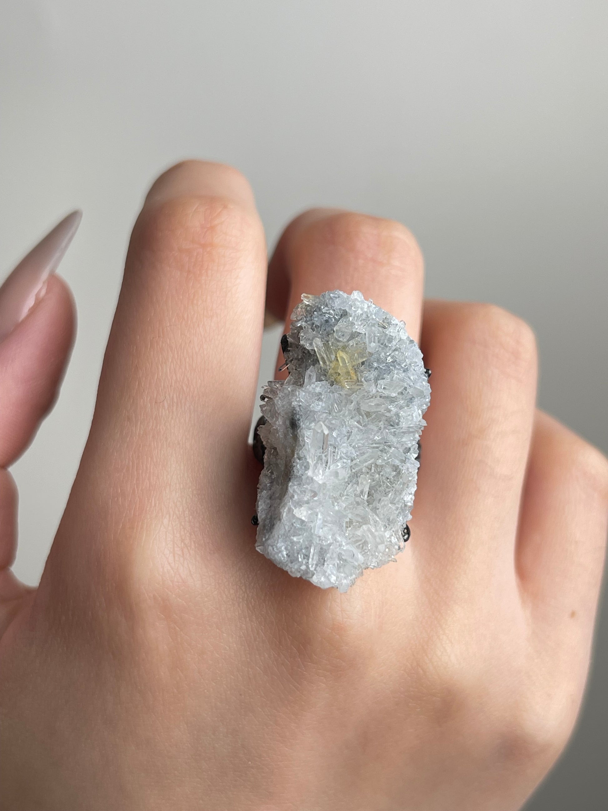 Needle Quartz Cluster Ring hand close-up