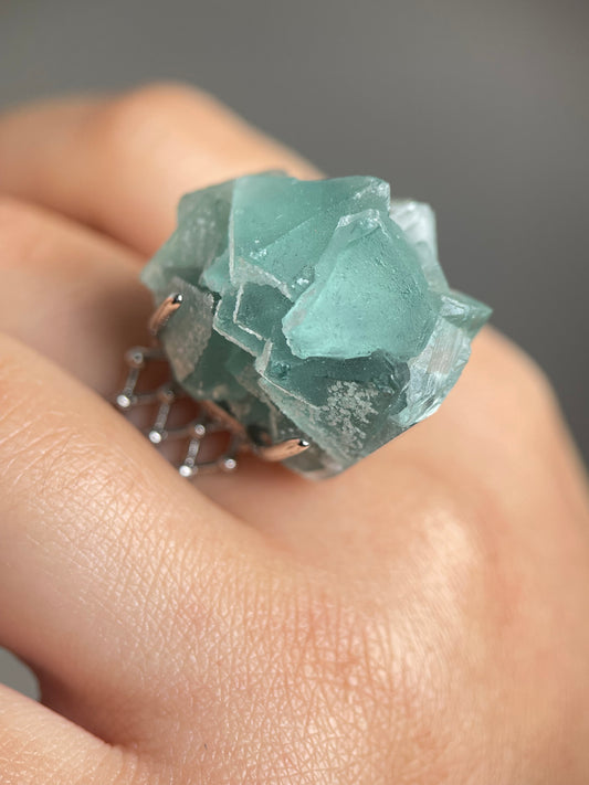 close up natural octahedral green fluorite crystal ring