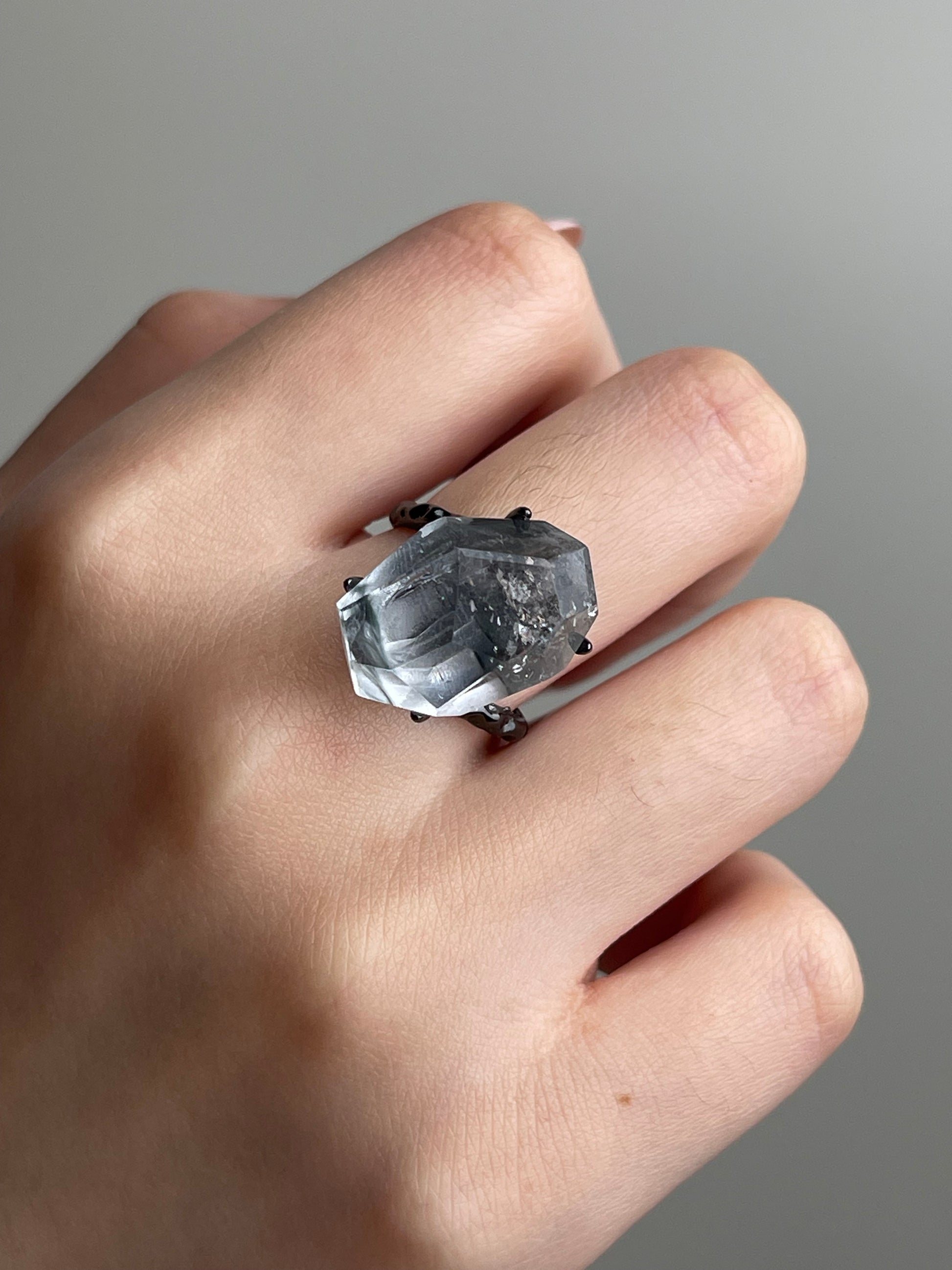 Close-up of Blue Rutile Quartz showing fine rutile needles inside quartz