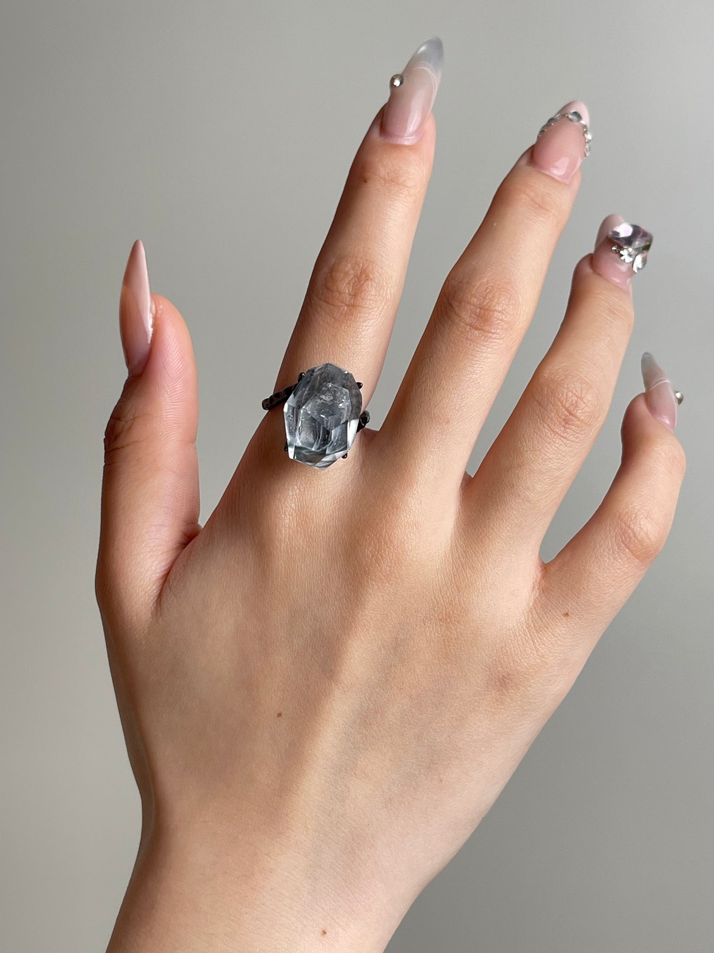 Blue Rutilated Quartz Freeform Ring worn on hand