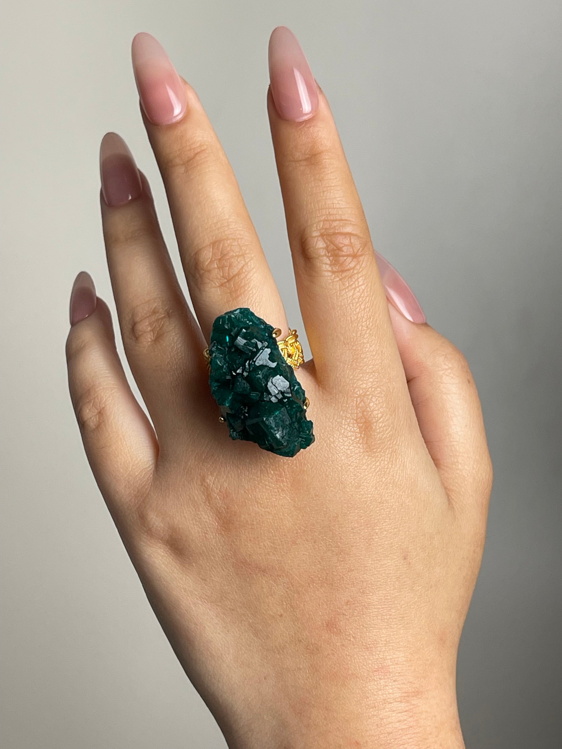 Raw Congo dioptase crystal ring worn on hand
