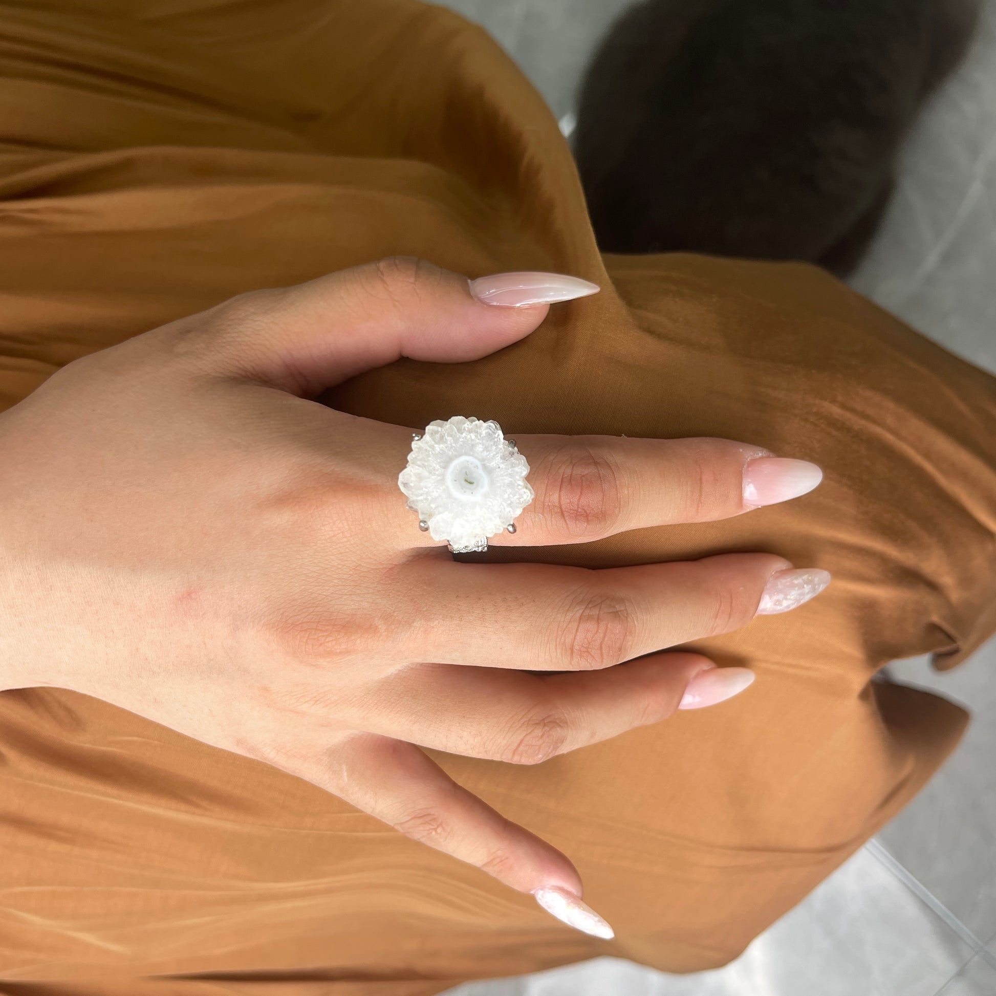 oryssia solar quartz crystal slice ring on hand