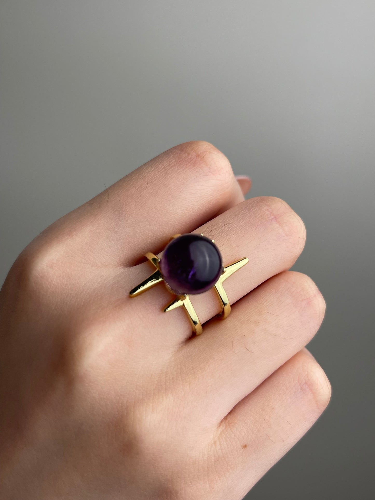 Close-up hand shot of Uruguay Amethyst Sphere Ring showing deep violet amethyst
