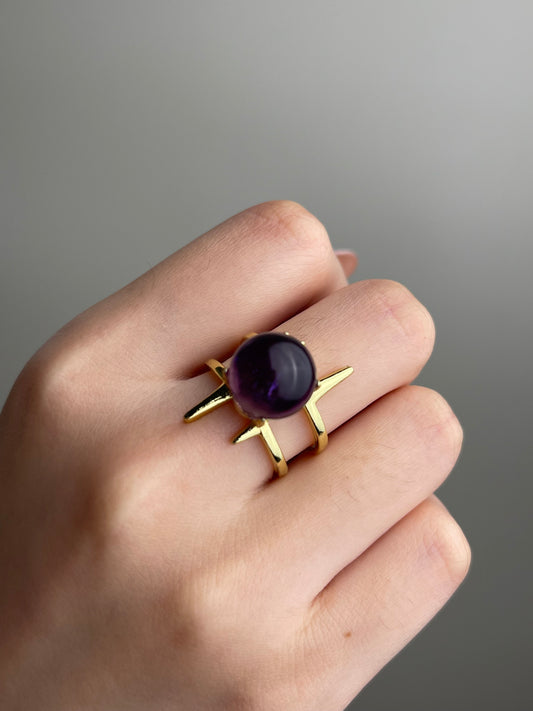 Close-up hand shot of Uruguay Amethyst Sphere Ring showing deep violet amethyst