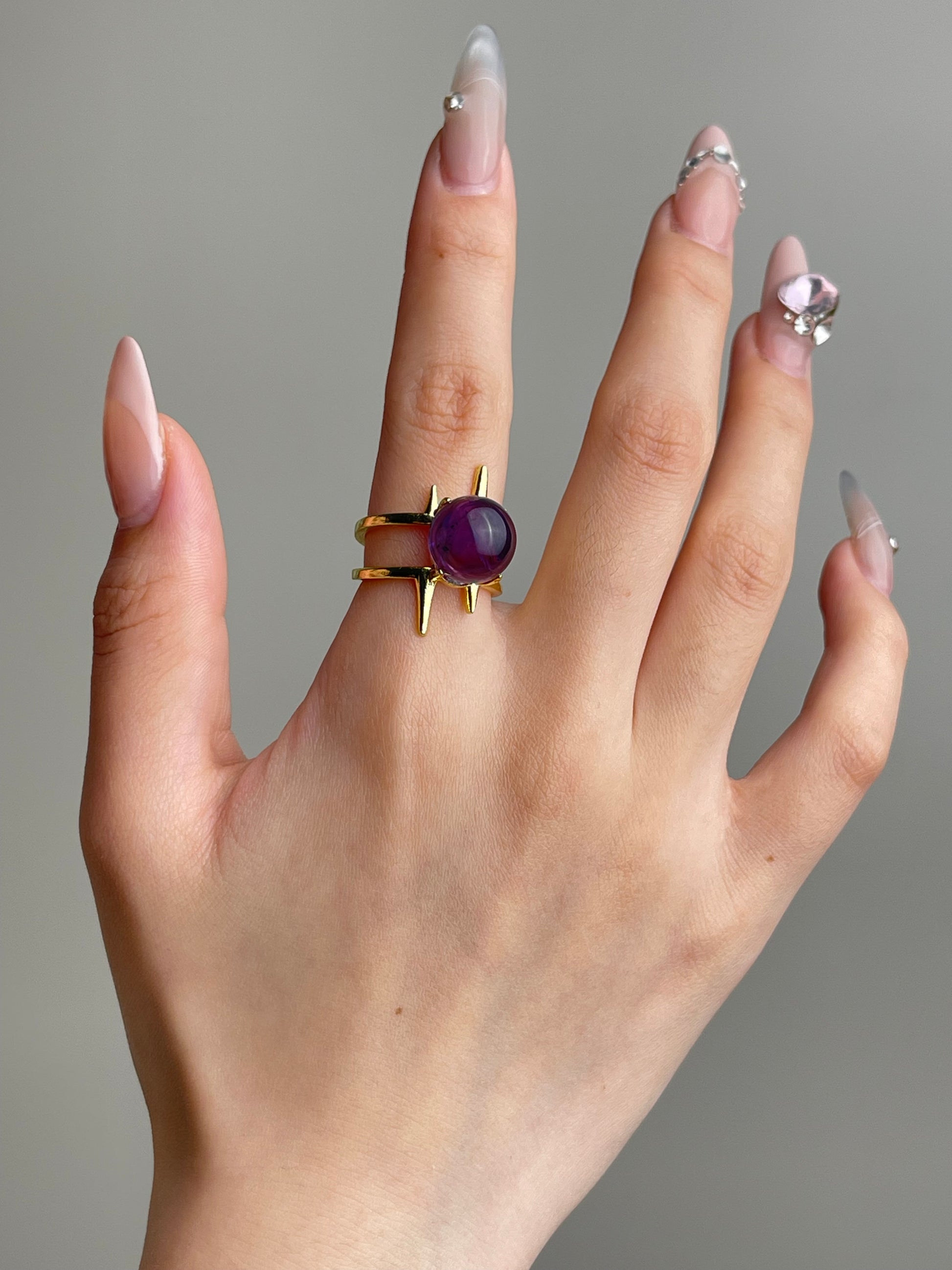 Uruguay Amethyst Sphere Ring worn on hand featuring deep purple quartz