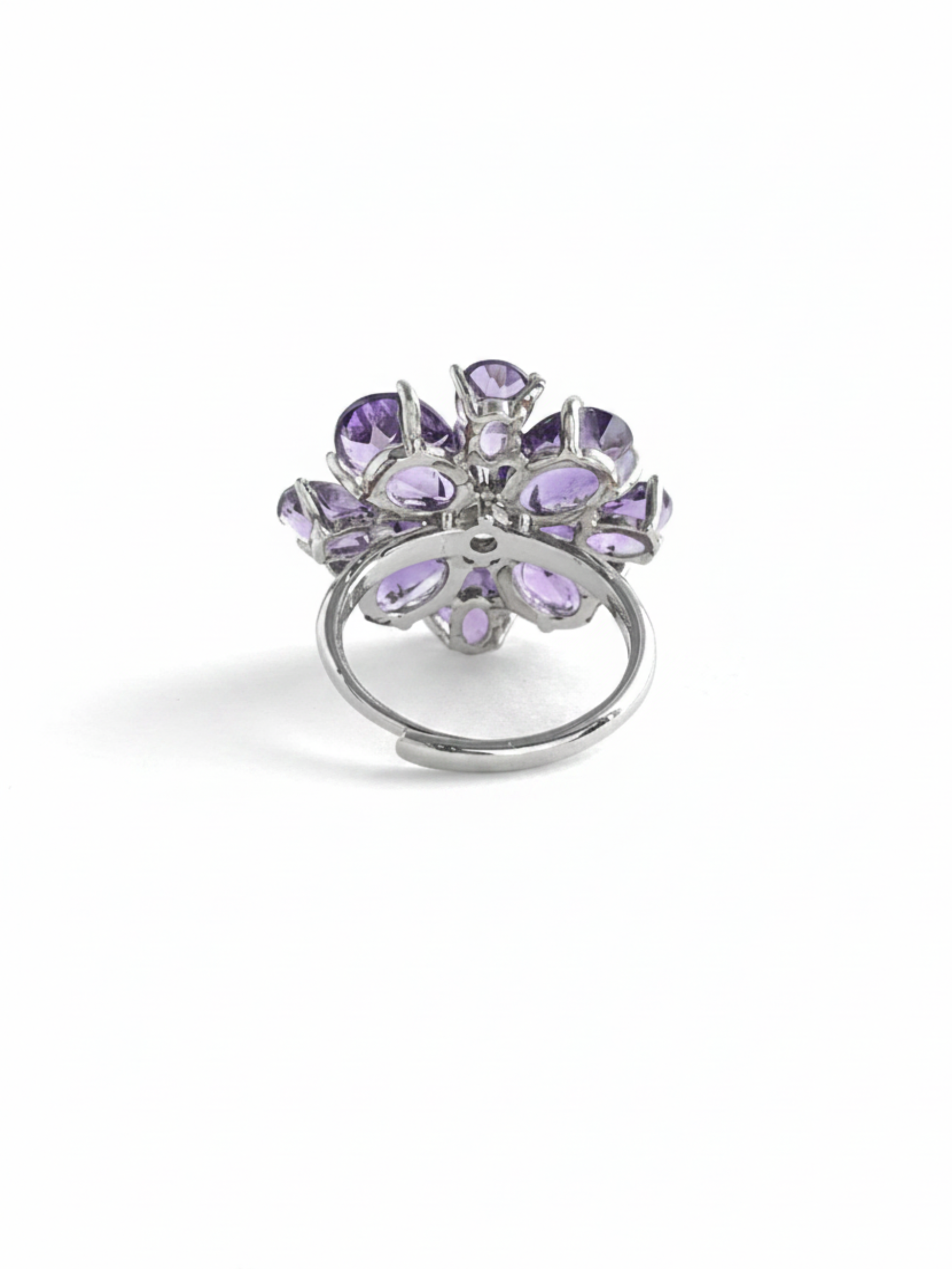 Back view of pear-cut amethyst snowflake ring with adjustable open band and silver-tone finish
