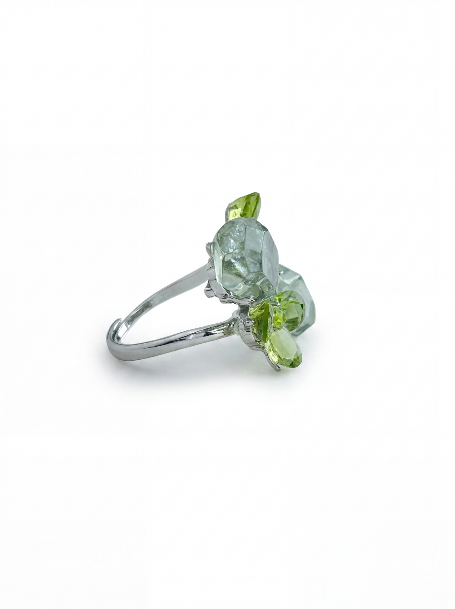 Side view of peridot bloom and green quartz ring