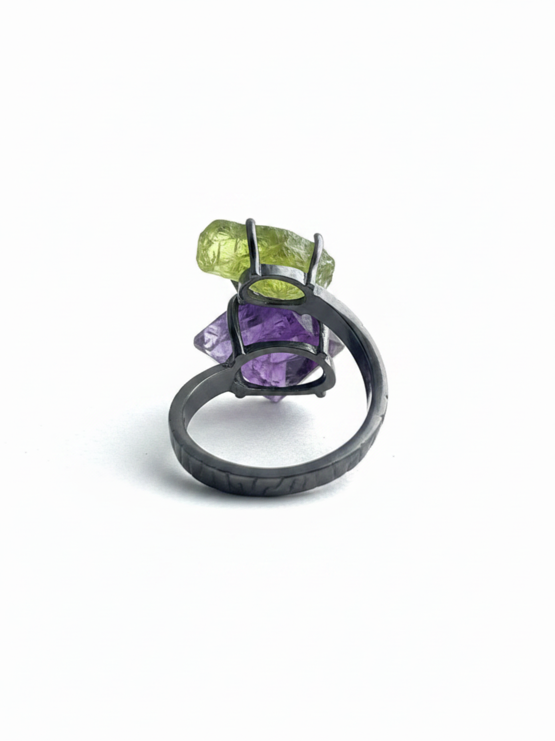 Back view of adjustable peridot and purple fluorite ring