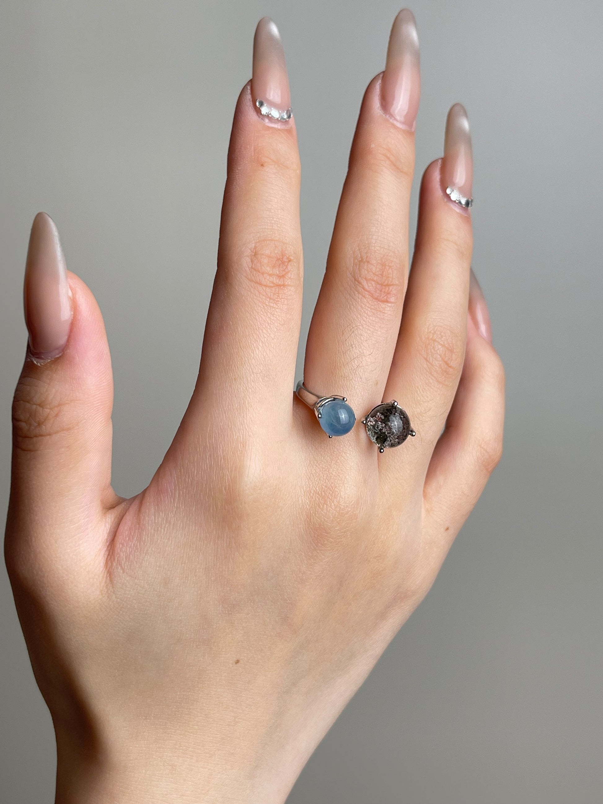 Phantom Quartz and Aquamarine sphere ring worn on hand