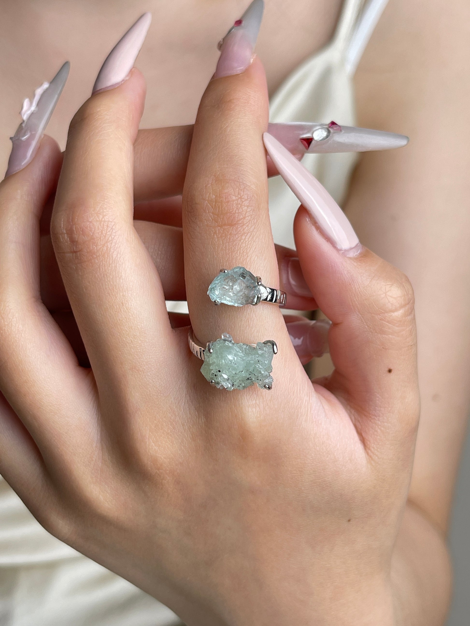 Green Prehnite with Quartz and Magnetite and Aquamarine ring worn on hand