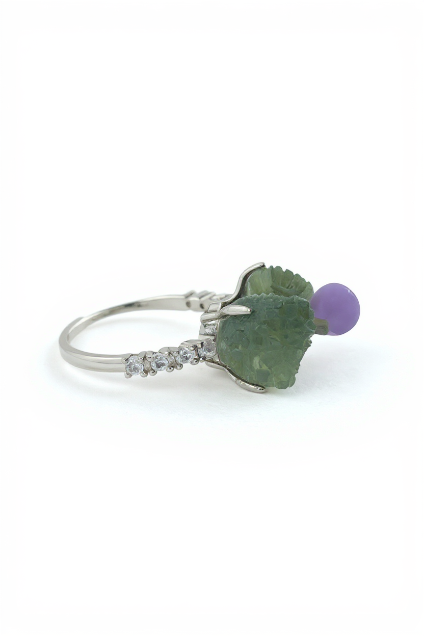 Side view of green prehnite and purple grape agate bow ring