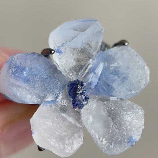 Video of dumortierite quartz flower ring with tanzanite fluorite center