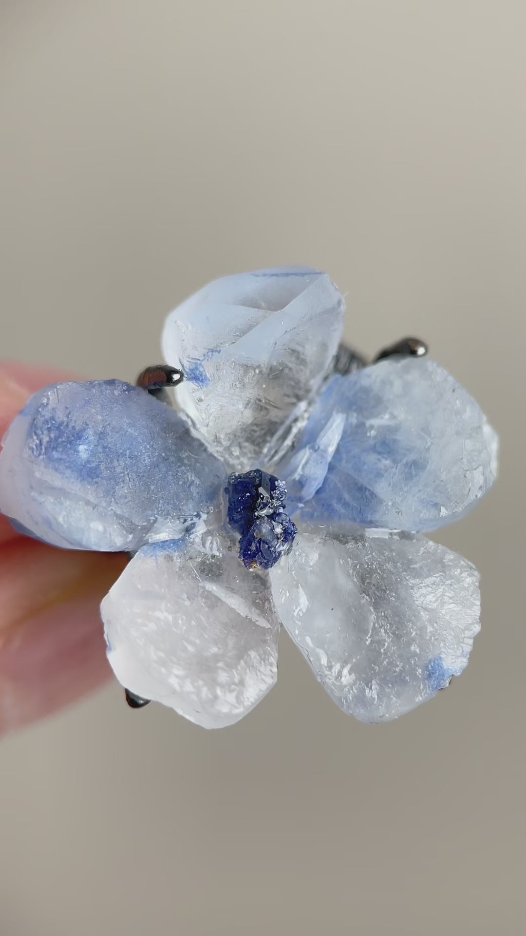 Video of dumortierite quartz flower ring with tanzanite fluorite center