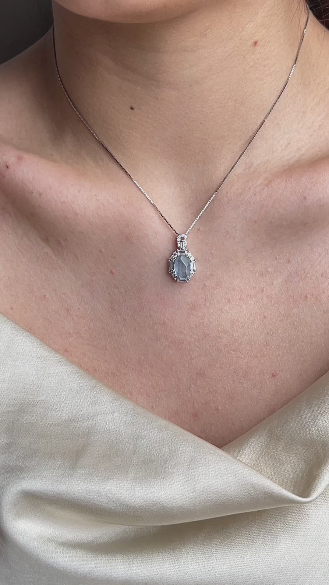 Aquamarine necklace in sterling silver featuring natural light blue crystal with clear ocean tone, elegant everyday jewelry