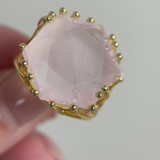 Rose quartz hexagon star cut ring featuring soft pink tones and geometric faceting, a refined crystal jewelry piece symbolizing love and gentle energy