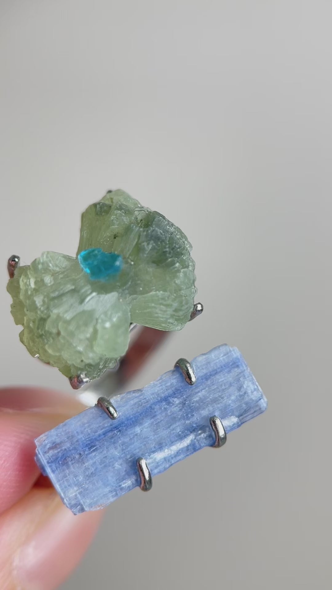 Green Prehnite, Blue Apatite and Kyanite bow ring showing natural crystal colours and detail