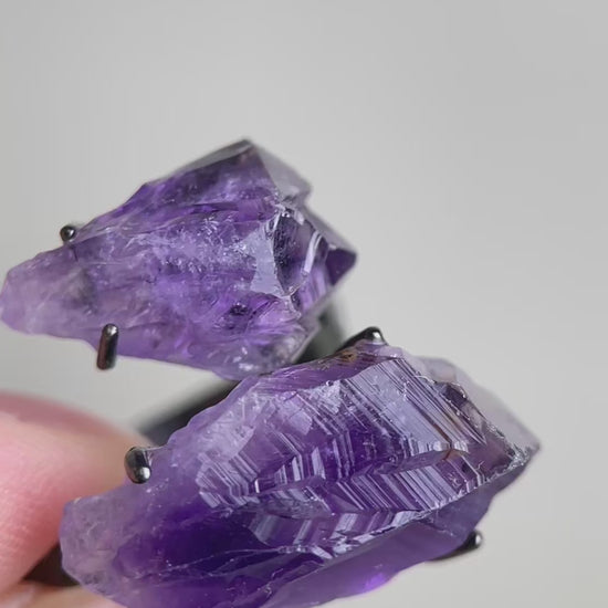 Video of raw Brazilian Amethyst crystal ring showing natural purple crystal points