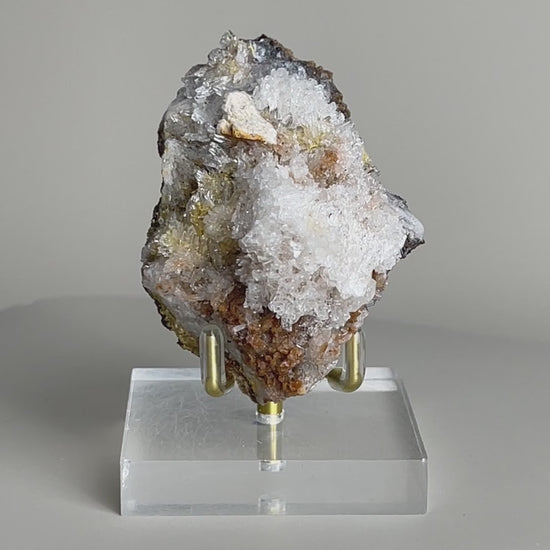 Video of Raw Creedite cluster mineral specimen on matrix from China