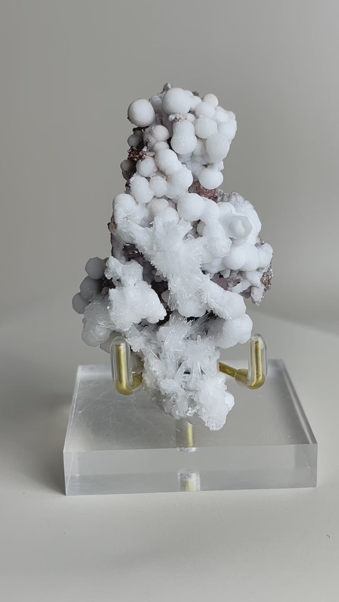 Botryoidal calcite with radiating aragonite texture detail video, showing natural spherical calcite formations with radiating crystal structure, a unique mineral specimen for collectors and display.