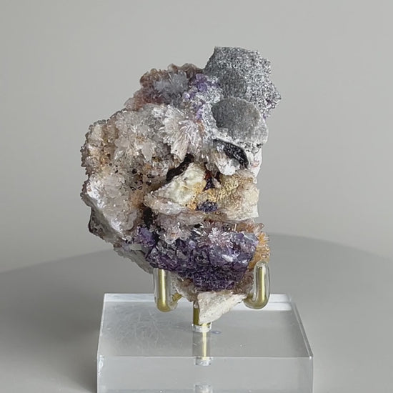 Video of Raw Creedite flower mineral specimen on matrix from China