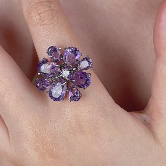 Video of a pear-cut amethyst snowflake ring featuring Brazilian amethyst stones in a delicate silver-tone setting
