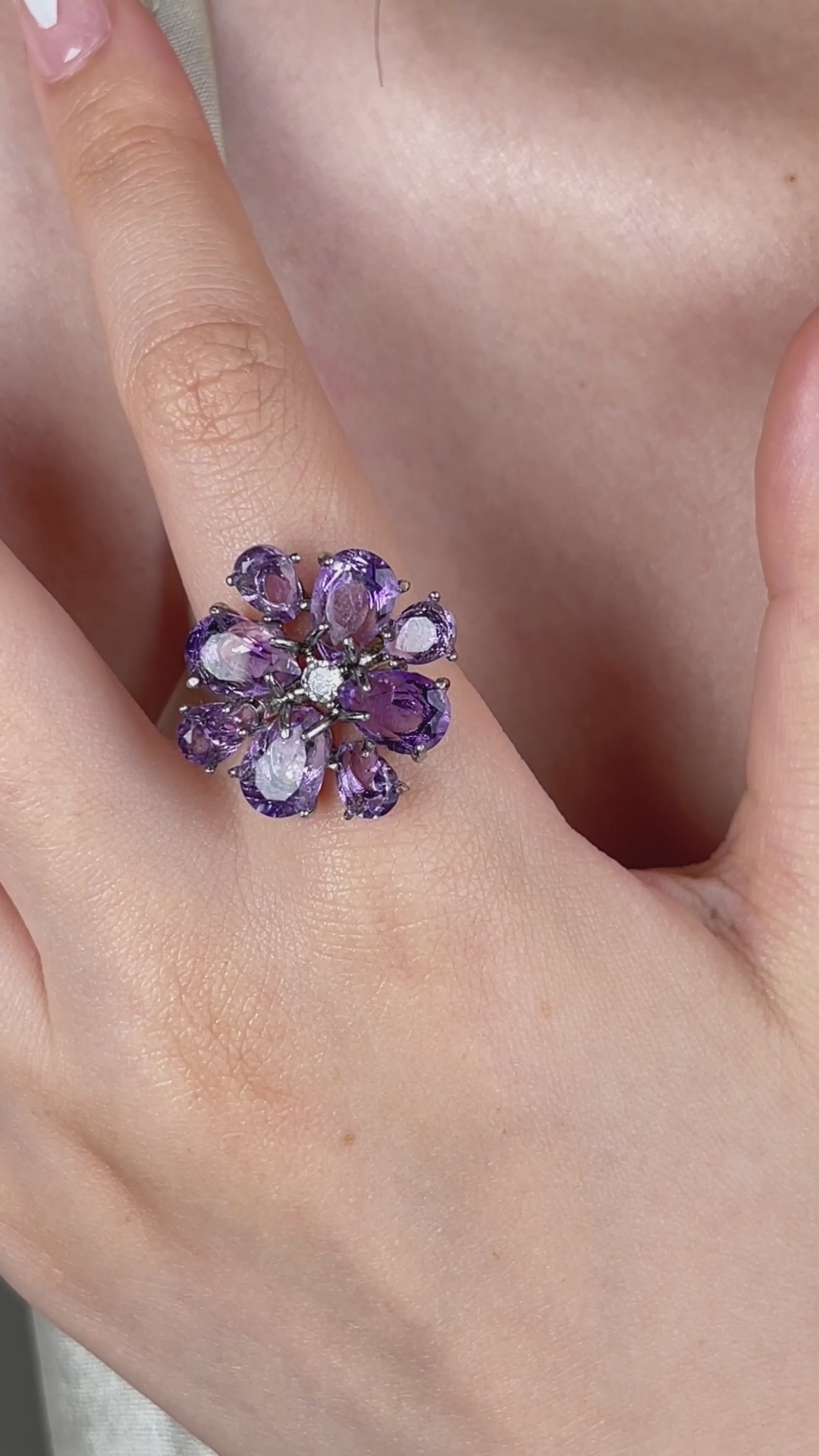 Video of a pear-cut amethyst snowflake ring featuring Brazilian amethyst stones in a delicate silver-tone setting