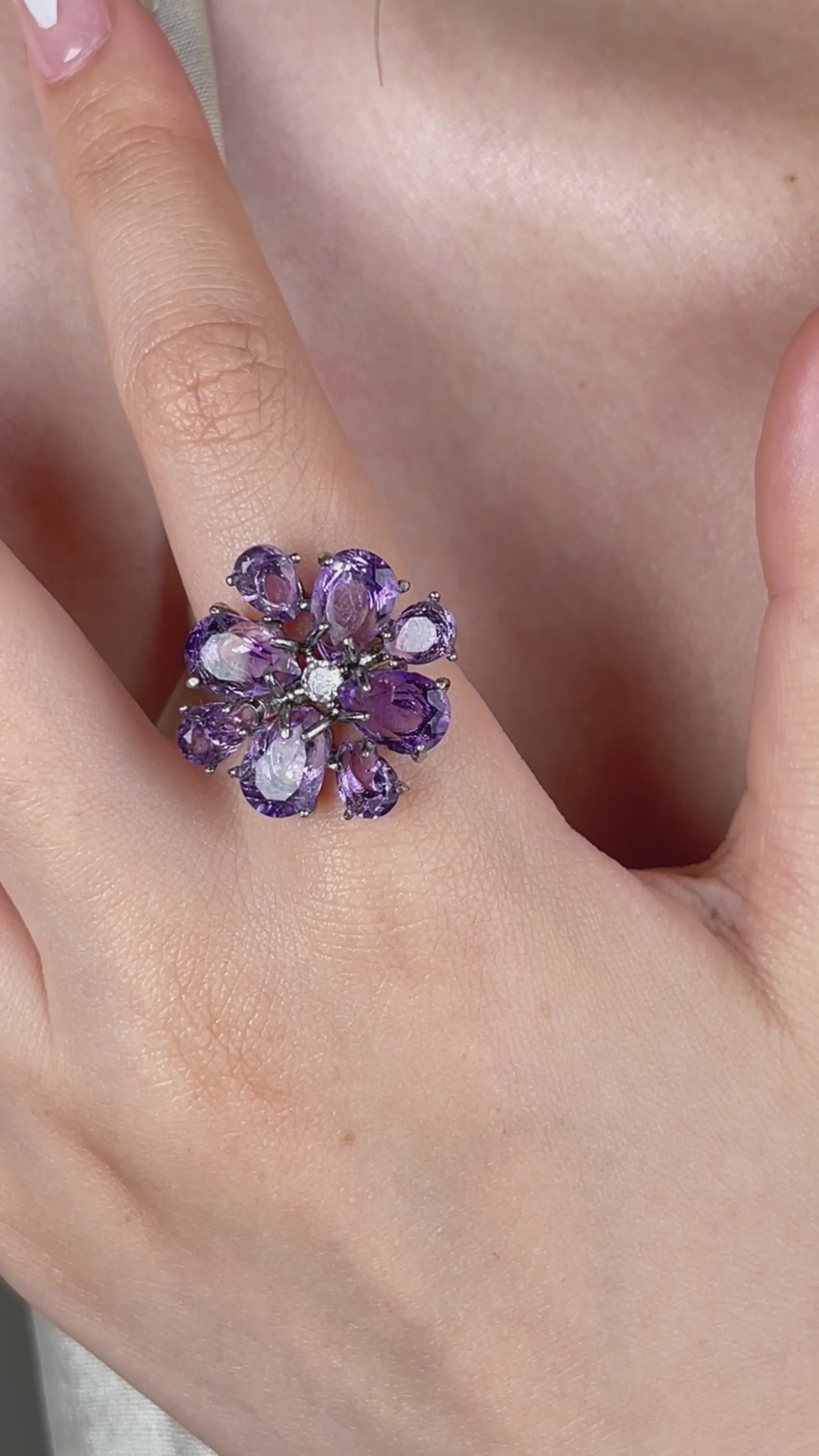 Video of a pear-cut amethyst snowflake ring featuring Brazilian amethyst stones in a delicate silver-tone setting