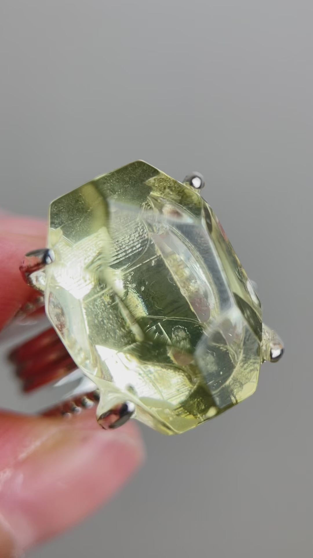 Video of hand-cut Brazilian citrine ring showing its freeform shape and warm golden quartz glow