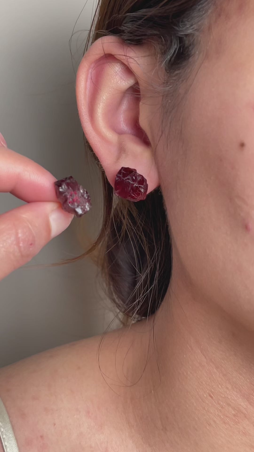 Video of raw Sri Lankan garnet stud earrings in natural crystal form