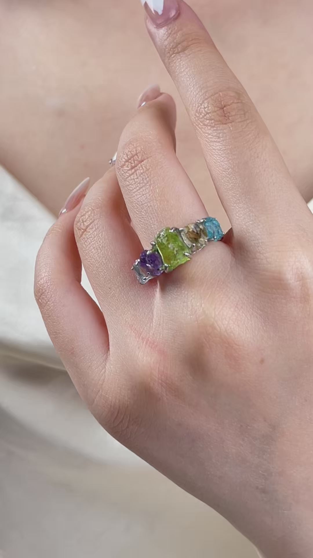 Video of rainbow raw crystal ring with aquamarine citrine peridot amethyst and blue apatite