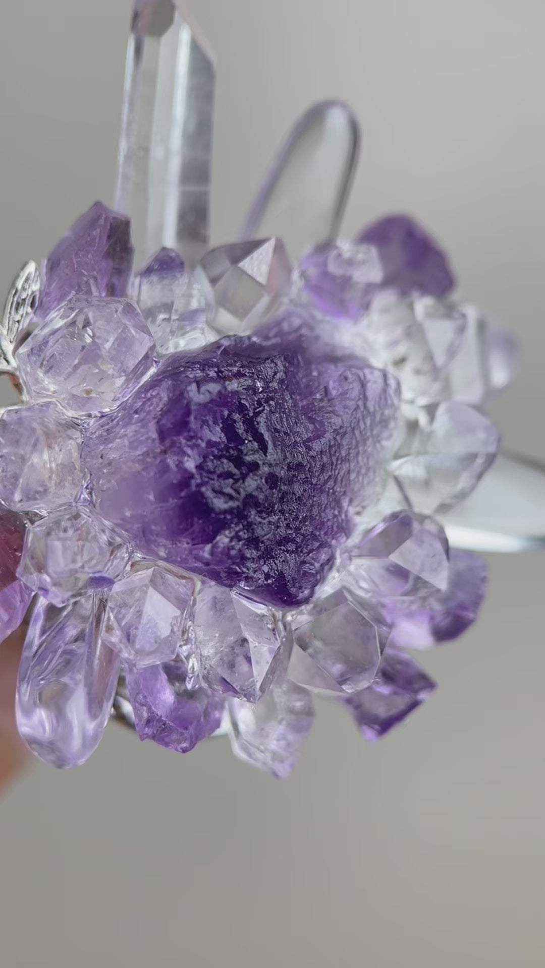 Video of raw Purple Fluorite, Amethyst, Herkimer Diamond Quartz, Lemurian Seed Quartz and Clear Quartz ring